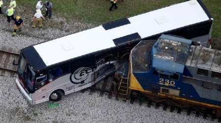 NTSB: Failure to fix grade crossing led to fatal train, bus crash